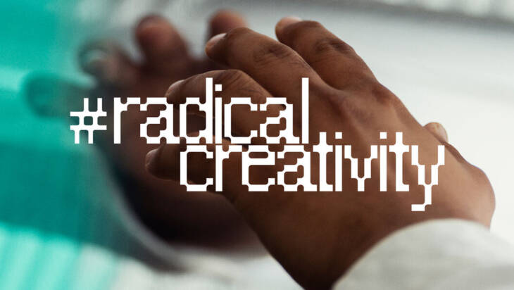 Image of a hand and a text "#radical creativity"